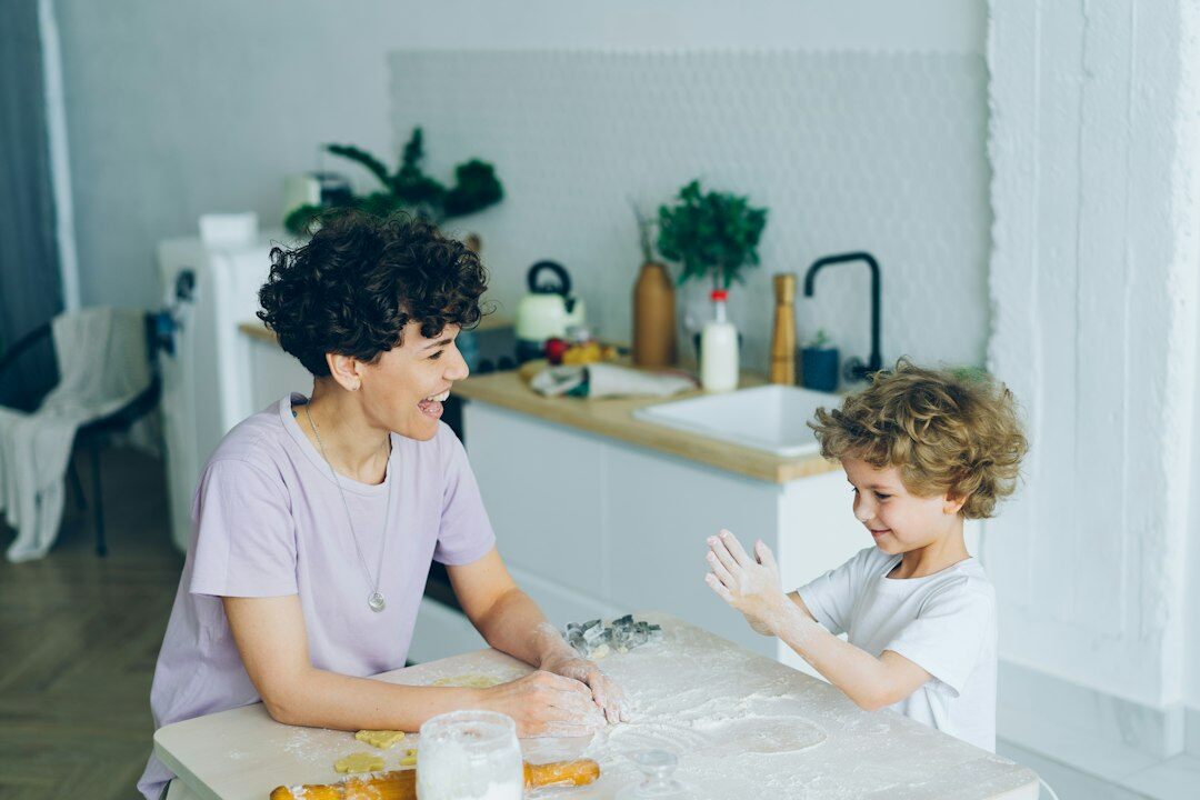 family discussing at kitchen table